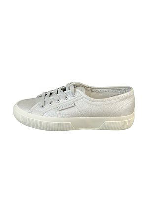 Light grey canvas sneaker with a textured surface, round toe, white rubber sole, and six eyelet lace-up design. Accent logo on side.
