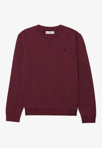 Felpa bordeaux in cotone, con scollatura rotonda e polsini a coste. Piccolo logo nero sul petto sinistro. Texture morbida.