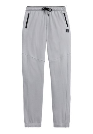 Helle graue Sweatpants mit einem Bund mit Kordelzug, Reißverschlusstaschen an den Seiten und Kontraststoffdetails. Weicher Stoff und schmal zulaufendes Beindesign.