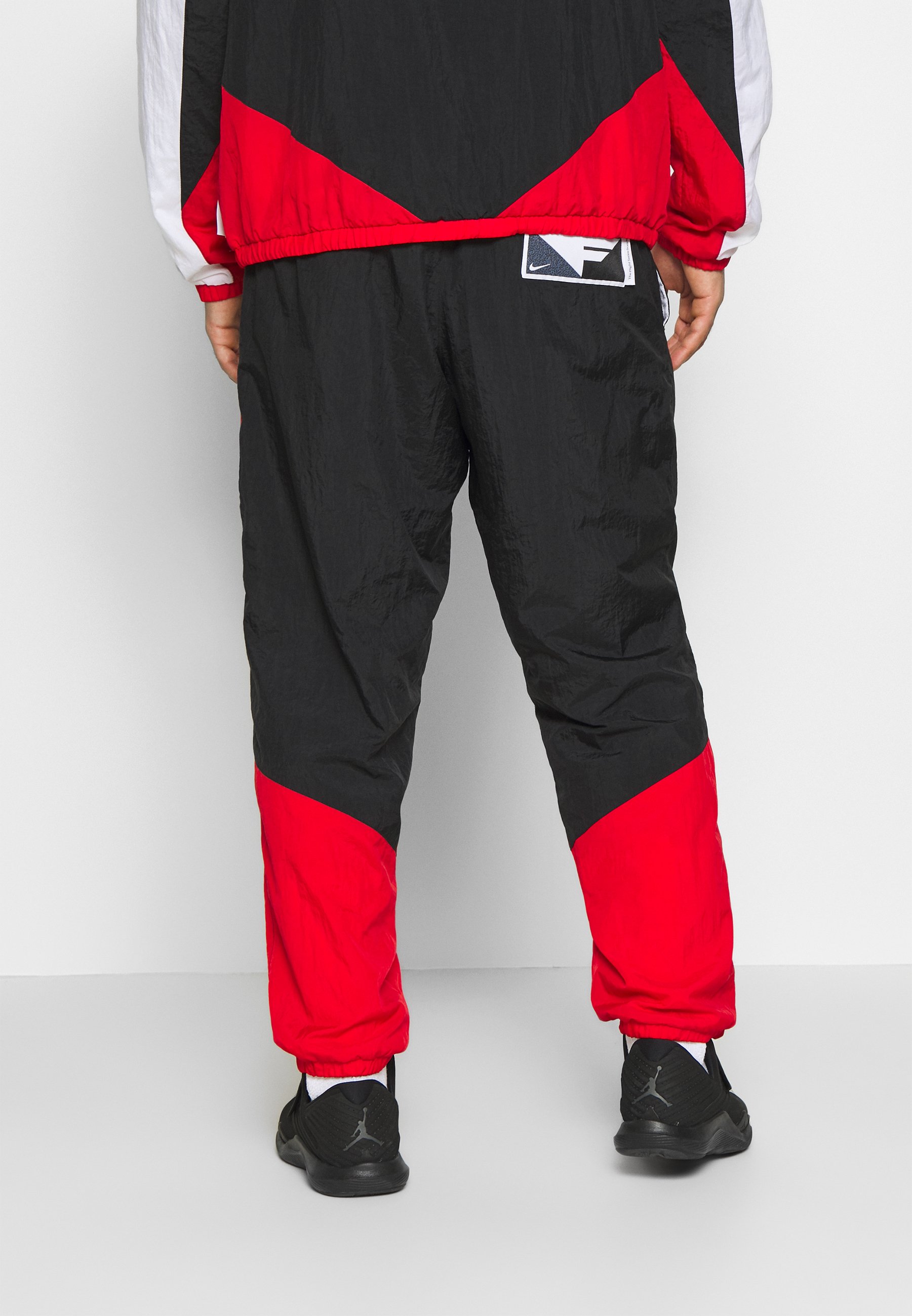 Nike Performance FLIGHT TRACKSUIT - Chándal - black/white/university  red/negro - Zalando.es