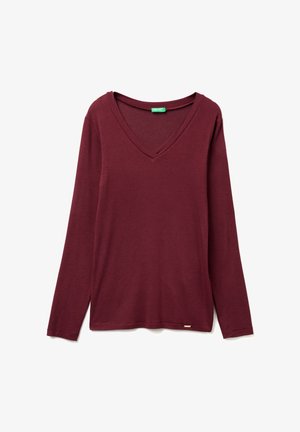 Burgundské dlouhé rukávy top s výstřihem do V vyrobený z měkké tkaniny. Disponuje jednoduchým designem, postranními rozparky a malou značkovou etiketou na spodním okraji.