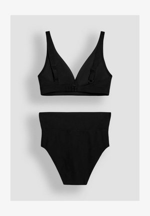 Must mustriga komplekt, millel on juhtmeta kolmnurkne rinnahoidja reguleeritavate rihmadega ja kõrgema vöökohaga aluspüksid, sile kangas ja saumae disain.