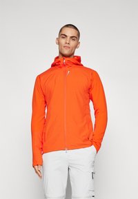 Men's zip-up jacket in bright orange, made of lightweight fabric. Features a hood, long sleeves, and a side zip pocket. Stretchy texture.