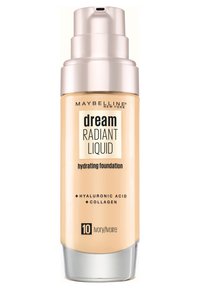 Fond de teint liquide Dream Radiant de Maybelline en ivoire. Bouteille en verre clair avec un capuchon à pompe argenté. Consistance lisse et liquide, étiquetée avec les ingrédients clés.