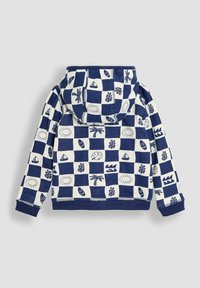 Hooded sweatshirt u krem i tamnoplavu boju, s kariranim uzorkom te grafikom suncem, palmama i jedrilicama. Mekana tkanina, elastične manžete na rukavima.