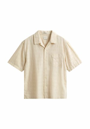 Camicia beige a maniche corte con bottoni, colletto e taschino sul petto, caratterizzata da un delicato motivo a quadretti sfumato.
