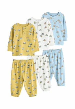 Three sets of children's long-sleeve tops and pants in yellow, white, and blue, each featuring small vehicle and bicycle prints.