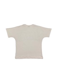 T-shirt oversize di un leggero beige con maniche corte, scollatura rotonda e una texture in cotone morbido. Nessuna grafica o motivo visibile sul retro.