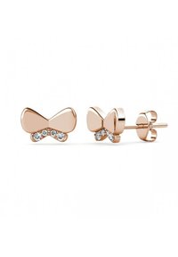 Orecchini a forma di fiocco in oro rosa, con accenti di strass trasparenti. Texture liscia, superficie lucida, che presenta un intricato design a fiocco.