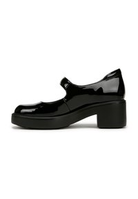 Scarpa Mary Jane in vernice nera con punta tonda, cinturino alla caviglia e tacco largo. Presenta una superficie liscia e un design minimalista.