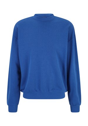 Sinine pusake kõrge kaelusega, pikkade varrukatega ja soonikkudega mansettide ning alläärega; valmistatud siledast, tekstureeritud kangast ja lõige on vaba.