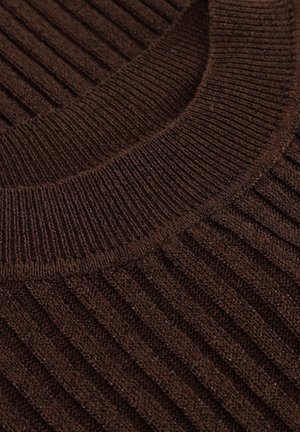 Dark brown ribbed knit fabric with a textured surface and a rounded collar. The pattern is consistent, featuring vertical ribbing throughout.