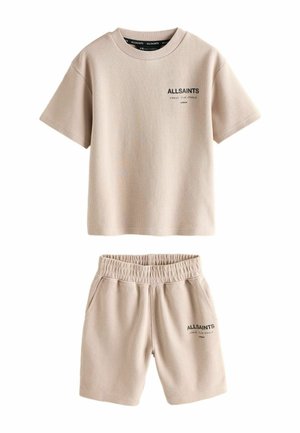 Béžové rebrované tričko s krátkym rukávom a zodpovedajúce šortky s elastickým pásom, s logom "ALLSAINTS" a japonským textom na hrudi a stehne.