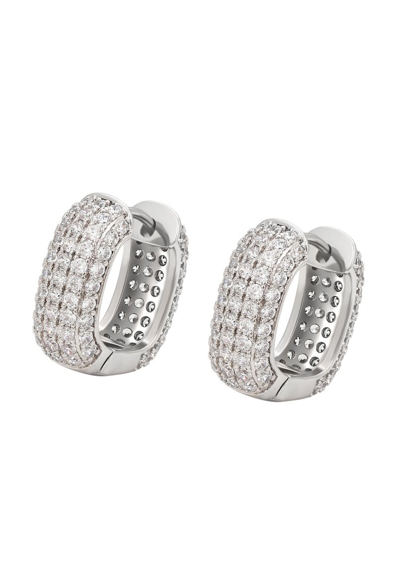 Sidabrinės auskarai-žiedai, puoštos keliais eilėmis mažų blizgančių skaidrių akmenėlių išorėje.