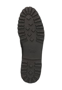 Zwarte rubberen zool met diepe profielen, met diamant- en vierkante patronen voor grip. Textuur en verheven merknaam zichtbaar.