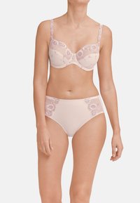 Lace-trimmed blush bra and matching high-waisted panties featuring floral embroidery, sheer details, and adjustable straps.