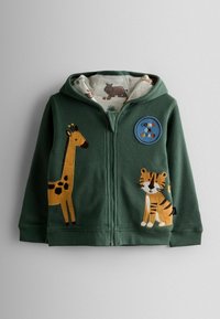 Grøn velour zip-up hoodie med applikationer af giraf og tiger, foret med et safari-tema stof, med et rundt "GOING ON SAFARI" patch.