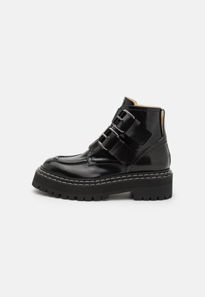 LUG SOLE BUCKLE - Platform ankle boots - black