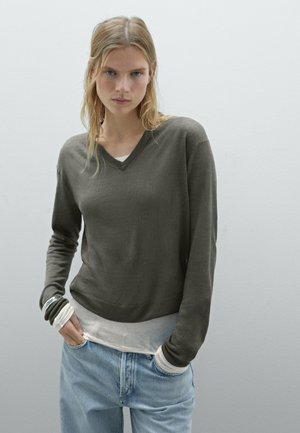 - Sweter