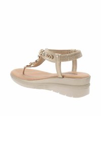 Sandali beige regolabili con suola spessa, design a T, dettagli in gemme decorative e soletta imbottita per il comfort.