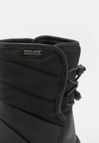 Keen PUFFRIDER WP UNISEX - Téli csizmák - black