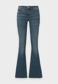 Flared blue jeans made of denim, featuring a mid-rise waist, front pockets, and subtle fading along the legs. Classic five-pocket style.