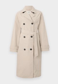 Beige trench kabát dupla gombolású elülső résszel és fekete gombokkal. Széles hajtókák, övvel ellátott derék és hosszú ujjú, galléros kivitel jellemzi.
