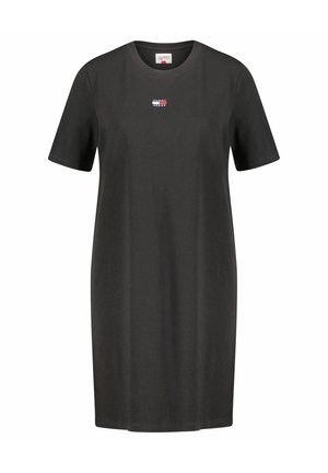 Czarna sukienka T-shirt z krótkim rękawem z małą prostokątną łatą z logo Tommy Jeans umieszczoną na środku klatki piersiowej.