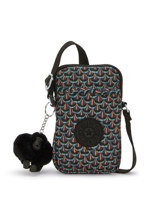 Compact crossbody bag in patterned fabric featuring teal, orange, and black scales, with a keychain gorilla charm and adjustable strap.