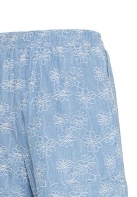 Light blue denim shorts with white embroidered floral patterns and an elastic waistband with side pockets.