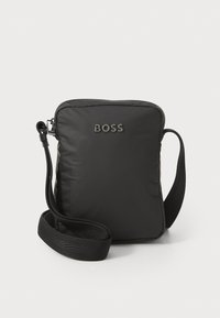 CATCH ZIP - Cross body bag - black