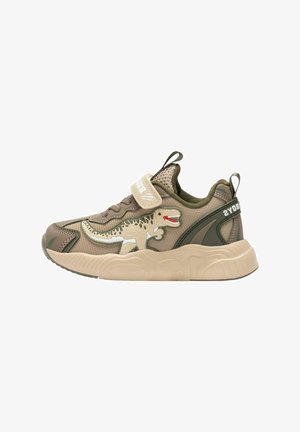 Sneaker marroni chiari con sopra in rete testurizzata, suola in gomma e grafica di dinosauro. Presentano una chiusura con cinturino a strappo.