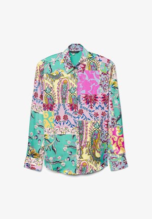 Chemise à manches longues présentant un design patchwork avec divers motifs floraux et cachemire dans des couleurs vives, incluant le turquoise, le rose et le jaune.