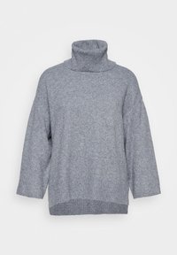 Grau gestrickter Pullover mit hohem Rollkragen, überschnittenen Schultern, langen Ärmeln und einem gerippten Saum. Verfügt über eine entspannte, lockere Passform.