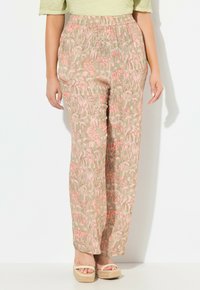 Pantaloni leggeri con vita elasticizzata, realizzati in un morbido tessuto verde tenue con un motivo di animali e piante rosa; design a gamba larga; texture liscia.