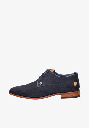 Navyblaue Herrenschuh aus strukturiertem Stoff mit Lederakzenten, abgerundeter Spitze und Absatz aus Holz. Verfügt über elegante Schnürsenkel und ein Logodetail.