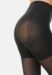 Svarta genomskinliga strumpbyxor med en slät textur, utrustade med en hög midja och en design med varierande opacitet som framhäver kurvor.