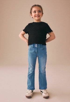 Next, REGULAR FIT - LOW RISE FLARED JEANS . - Flared Jeans - mid blue denim