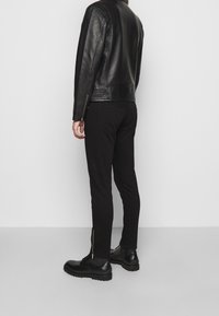 The Kooples Giacca di pelle - black