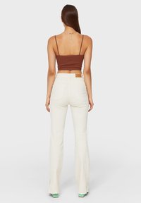 Stradivarius Flared Jeans - mottled beige