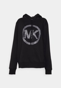 Black hoodie with a zip front, featuring a large leopard print "MK" logo on the chest and drawstrings on the hood. Soft fabric texture.
