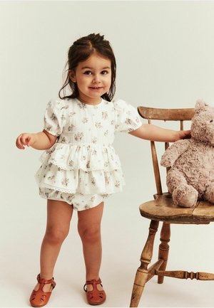 Newbie, FLORAL JUMPSUIT WITH FRILL - Combinaison - off-white