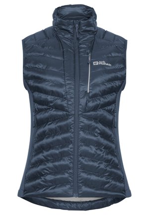 Gilet matelassé bleu marine avec un col haut, un matelassage vertical, une fermeture éclair à l'avant et une poche sur la poitrine. Texture lisse et matériau léger.