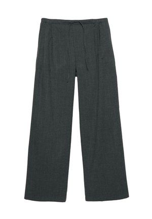 Tummanharmaat leveälahkeiset housut, jotka on valmistettu pehmeästä kankaasta. Niissä on kiristysnyöri vyötäröllä, hillityt pystysuorat raidat ja sivutaskut.