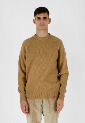 Maglione khaki a coste con colletto rotondo e maniche raglan. Presenta un maglione a trama testurizzata e un piccolo logo sull'orlo.