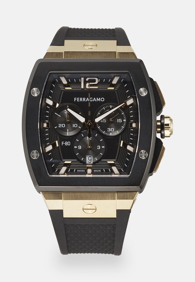 Schwarze rechteckige Uhr mit goldenen Akzenten, ausgestattet mit drei Subdials, einem strukturierten Gummiband und einem geometrischen Ziffernblatt-Design mit weißen Markierungen.