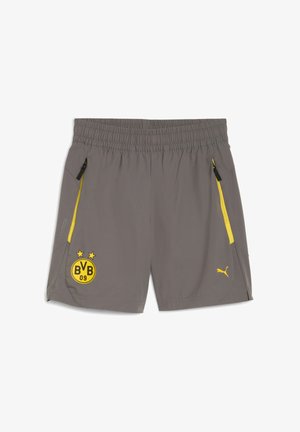 Sivé športové šortky s elastickým pásom, žlté zipsy na bočných vreckách a čierno-žlté logo s nápisom "BVB 09" a dvoma hviezdami.