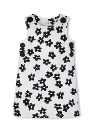 Weißes ärmelloses Kleid mit einem auffälligen schwarzen Blumenmuster und großen schwarzen Knöpfen an den Schultern. Glatter Stoff mit geradem Schnitt.