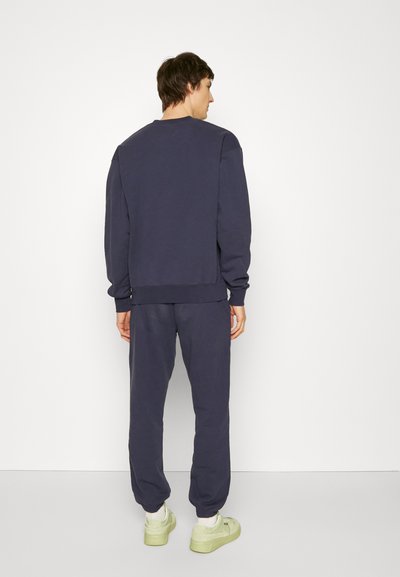 7 DAYS Active PANTS UNISEX - Donji dijelovi trenirke - navy