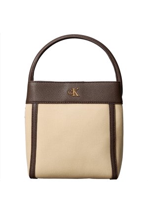 Sac à main en toile beige avec garniture et poignée en cuir marron foncé, avec petit logo doré « cK » à l'avant.